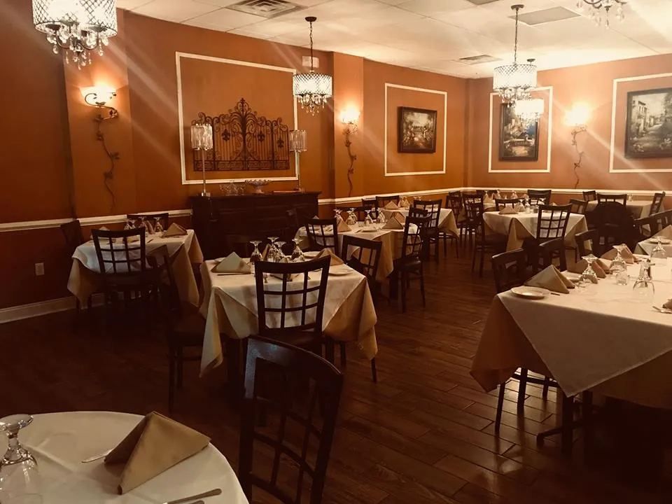 Buon Appetito dining room with white tablecloths